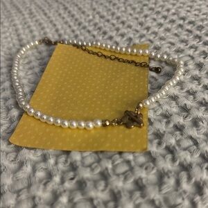 Elegant Pearl Necklace with Gold Accents